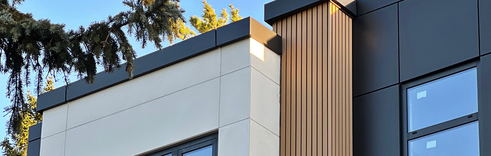 Charcoal ACM and Fluted Wood Planks Add Bold Detail to Sonata Cres.