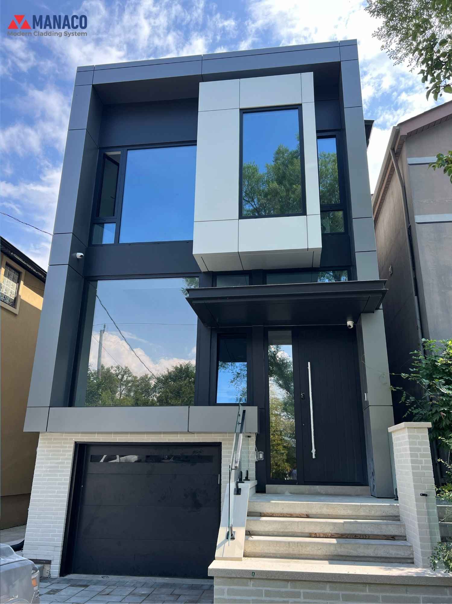 Front elevation with Metallic Grey ALUBOND ACM frames tying upper level on Melrose Ave North York